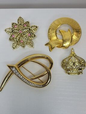 Gold Tone Crown and Leaf Brooch Set